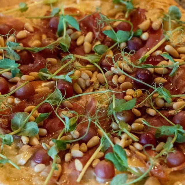 Brie-lliant prosciutto flatbread.