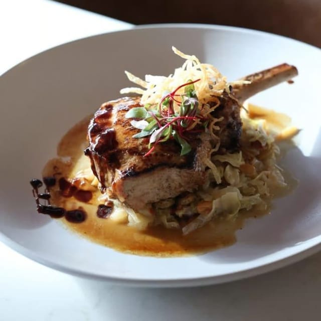 Grilled double-cut pork chop.
